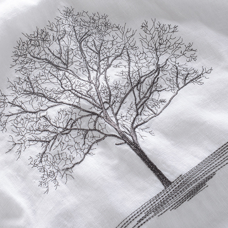Embroidered short sleeve in a tree