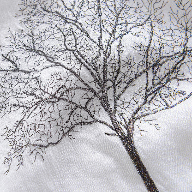 Embroidered short sleeve in a tree